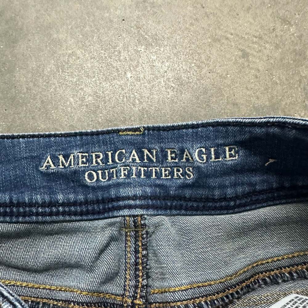American Eagle Outfitters Flap Pocket Embellished Low-Rise Kick Bootcut Jeans - Picture 3 of 8
